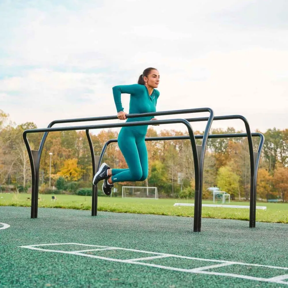 Athletic posture on grass during daylight